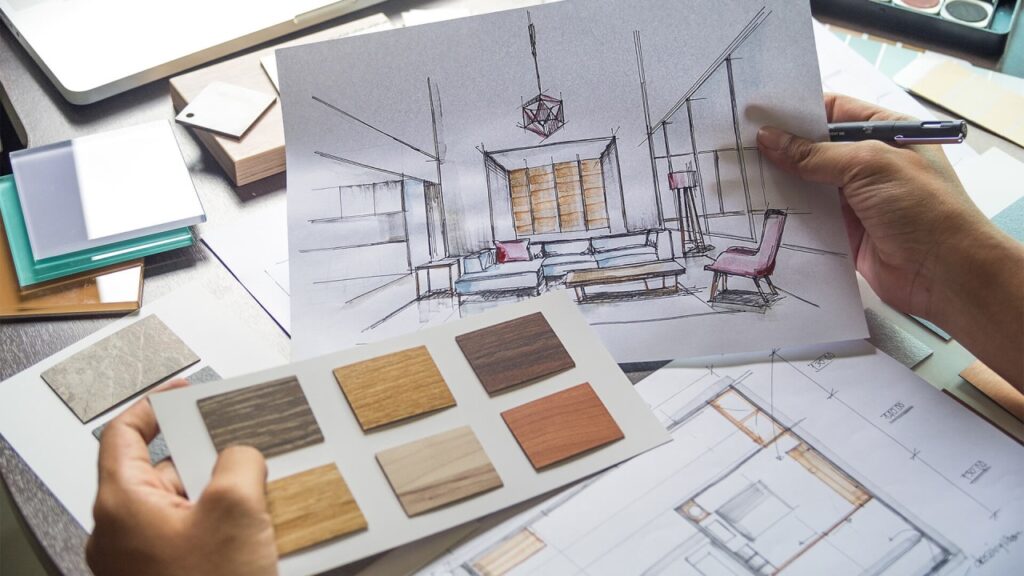 Interior designer holding samples and sketches